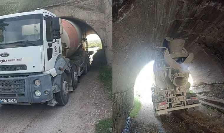 Şoför yüksekliği hesap edemedi, beton mikseri köprüye sıkıştı